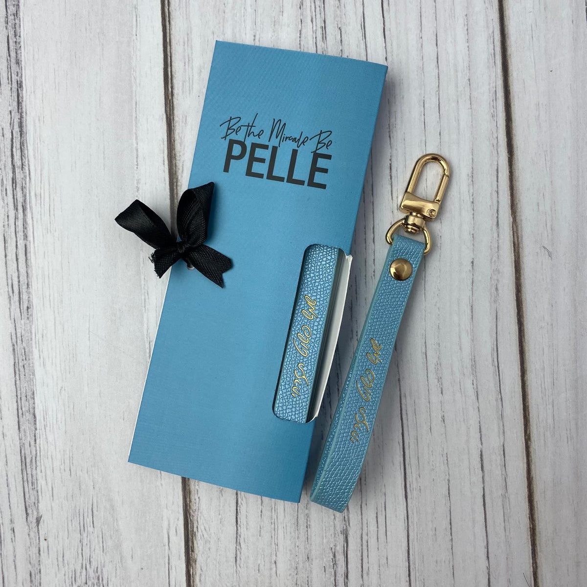 מחזיק מפתחות דמוי עור תכלת שמש פשוט תזרחי 3