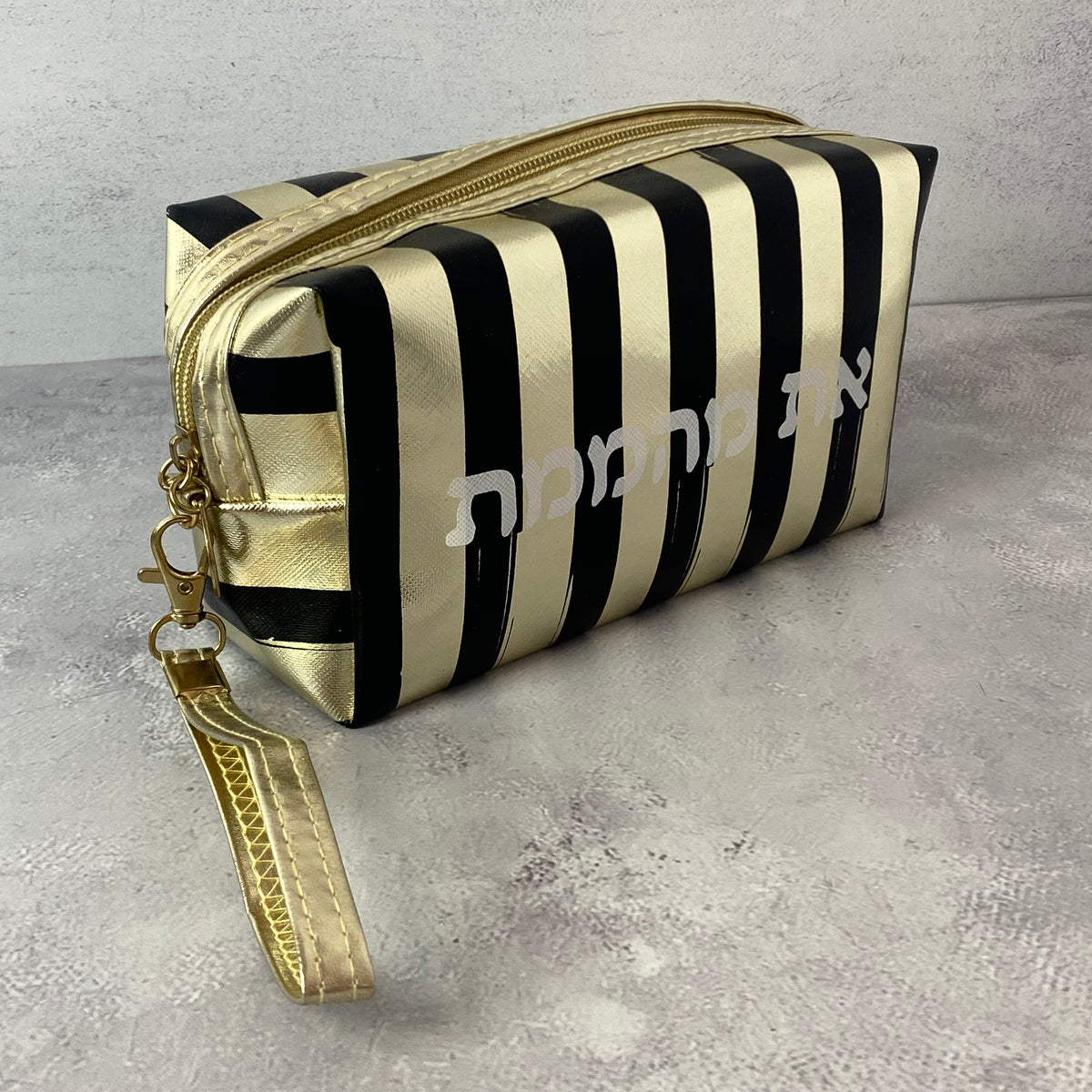 תיק איפור שחור זהב | את מהממת