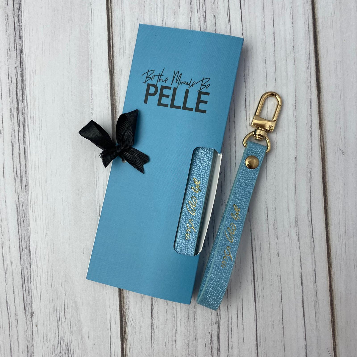 מחזיק מפתחות דמוי עור תכלת שמש פשוט תזרחי 2